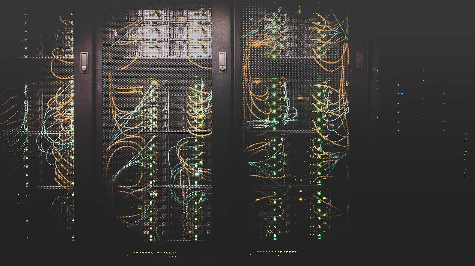 A corridor of server racks in a data centre